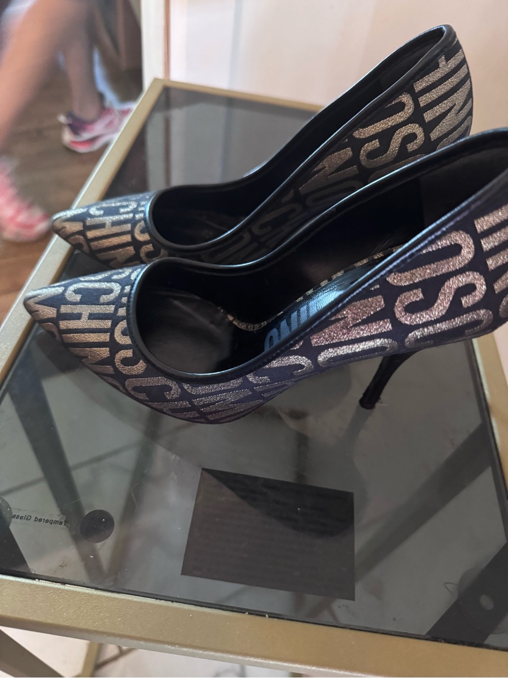 Moschino Black Logo Pointed Toe Pumps with Metallic Print